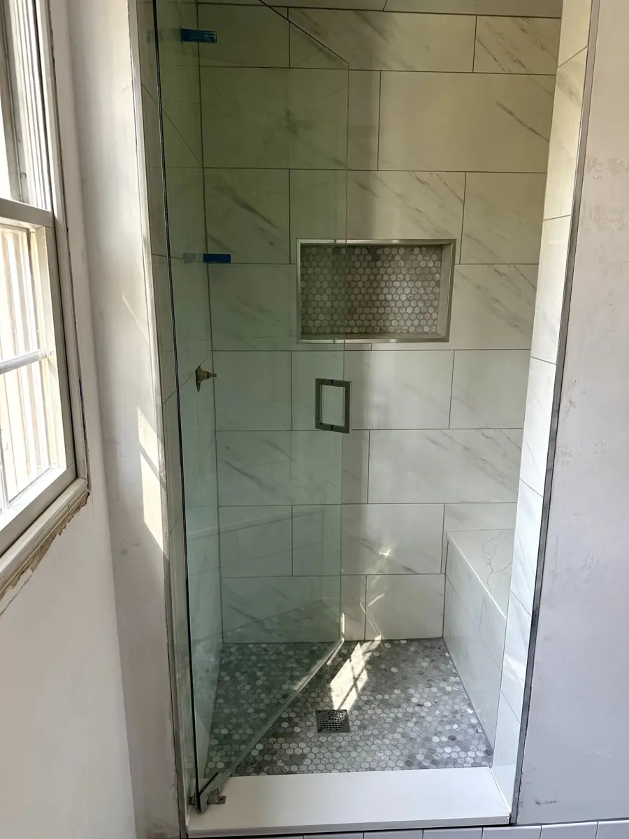 Contemporary bathroom tile installation with heated floors
